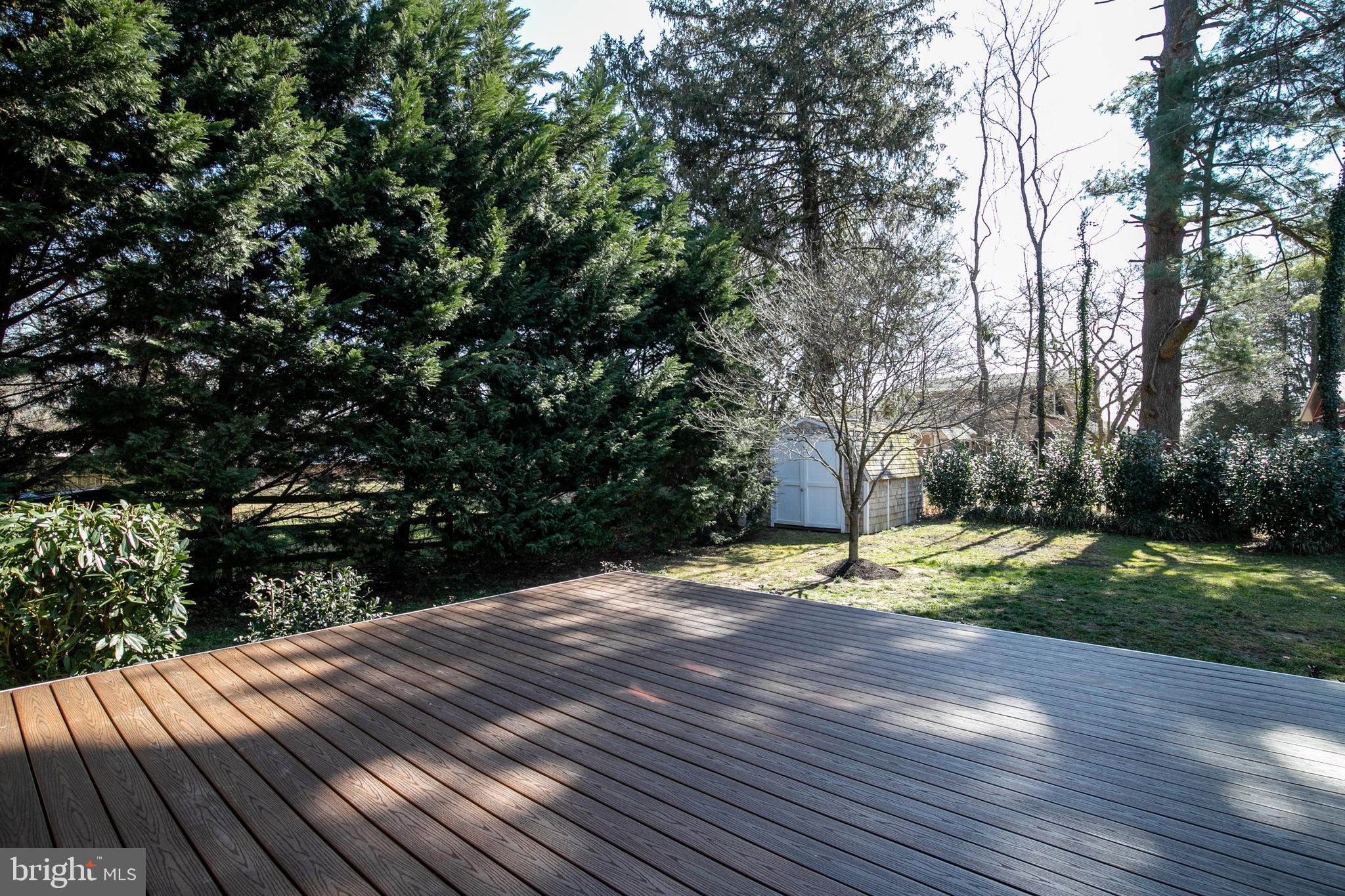 727 Whitehall Beach Road Annapolis, MD 21409 - Photo 31 of 44 a view of a backyard with wooden floor