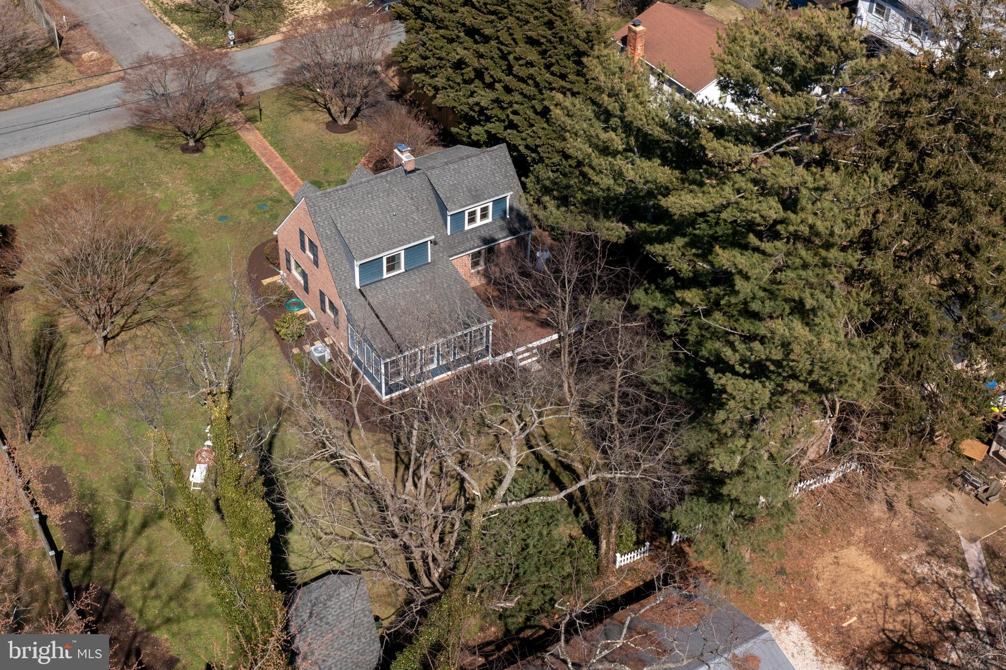 727 Whitehall Beach Road Annapolis, MD 21409 - Photo 32 of 44 an aerial view of a house with a yard
