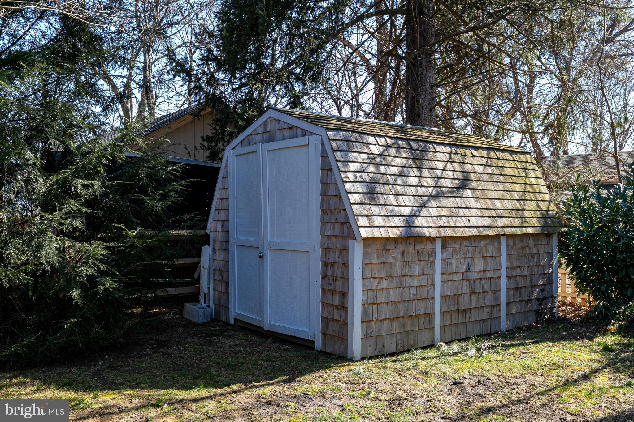 727 Whitehall Beach Road Annapolis, MD 21409 - Photo 33 of 44 a view of house with backyard and wooden fence