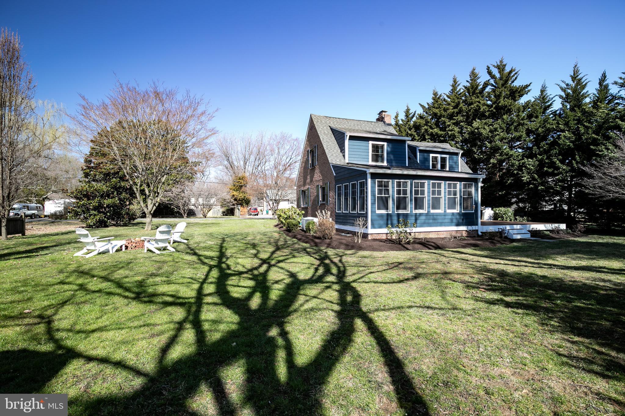 727 Whitehall Beach Road Annapolis, MD 21409 - Photo 39 of 44 a view of a house with a yard