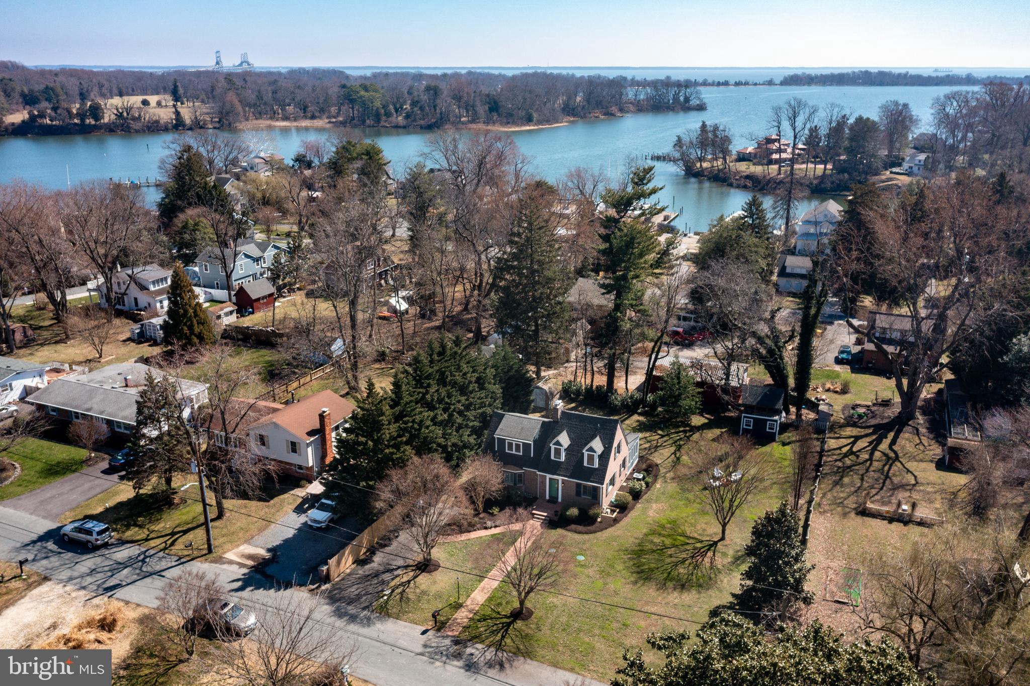 727 Whitehall Beach Road Annapolis, MD 21409 - Photo 40 of 44 an aerial view of a house with a lake view