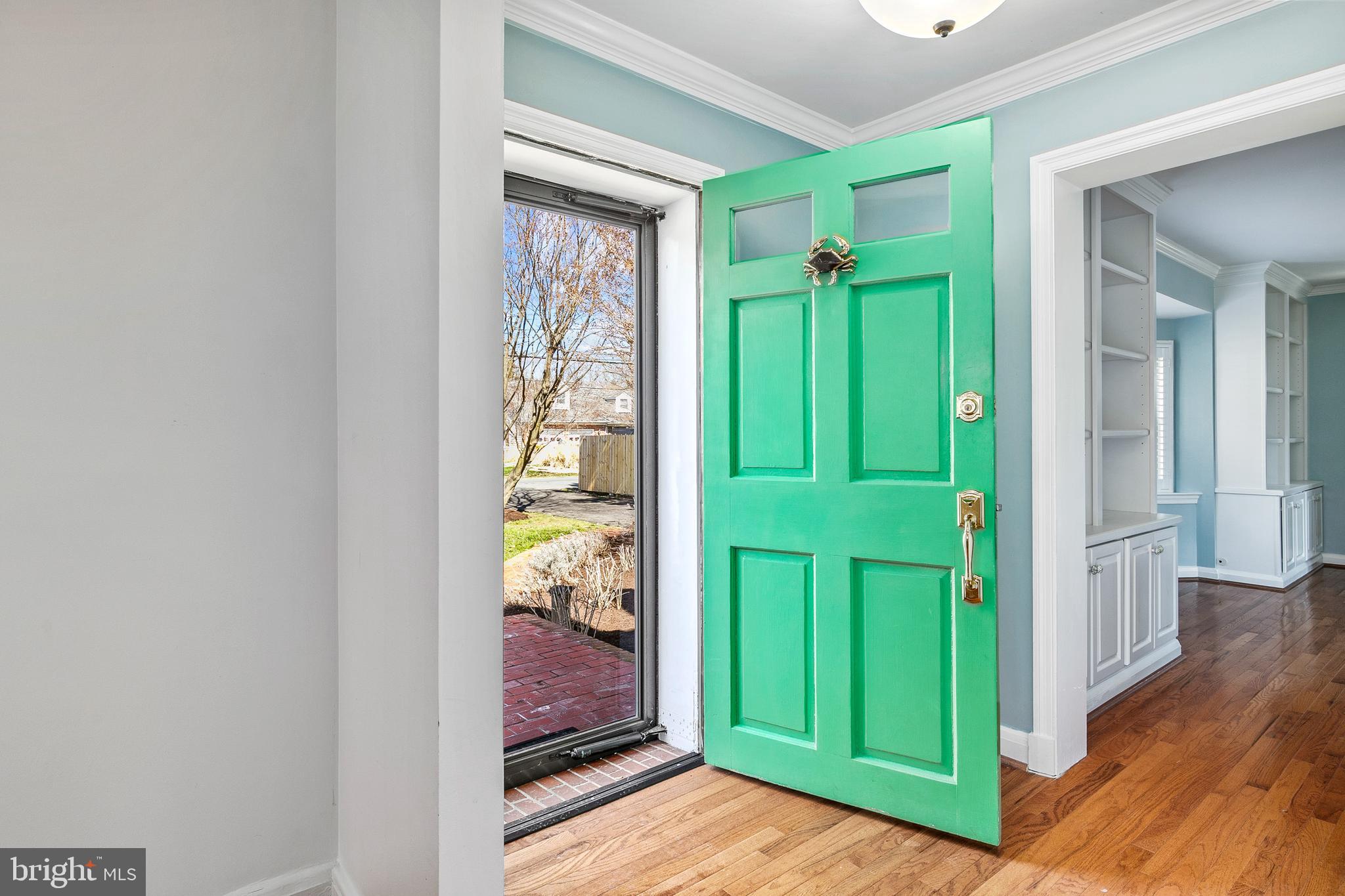 727 Whitehall Beach Road Annapolis, MD 21409 - Photo 5 of 44 a view of an entryway with wooden floor