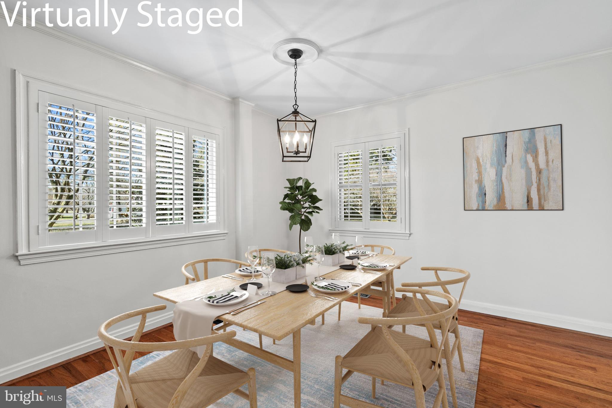 727 Whitehall Beach Road Annapolis, MD 21409 - Photo 10 of 44 a dining room with furniture and window