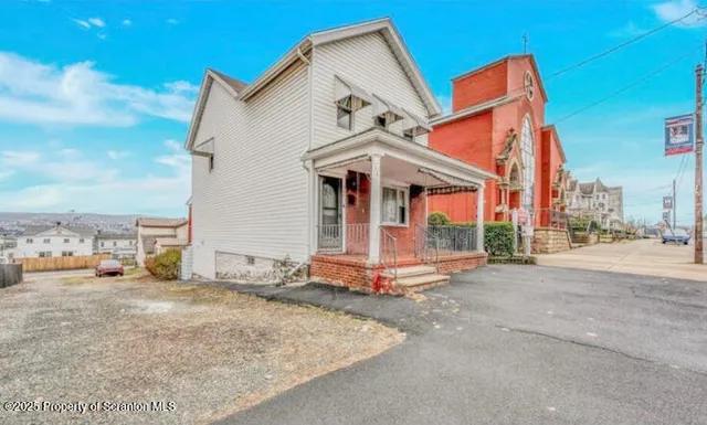 a view of a house with a patio