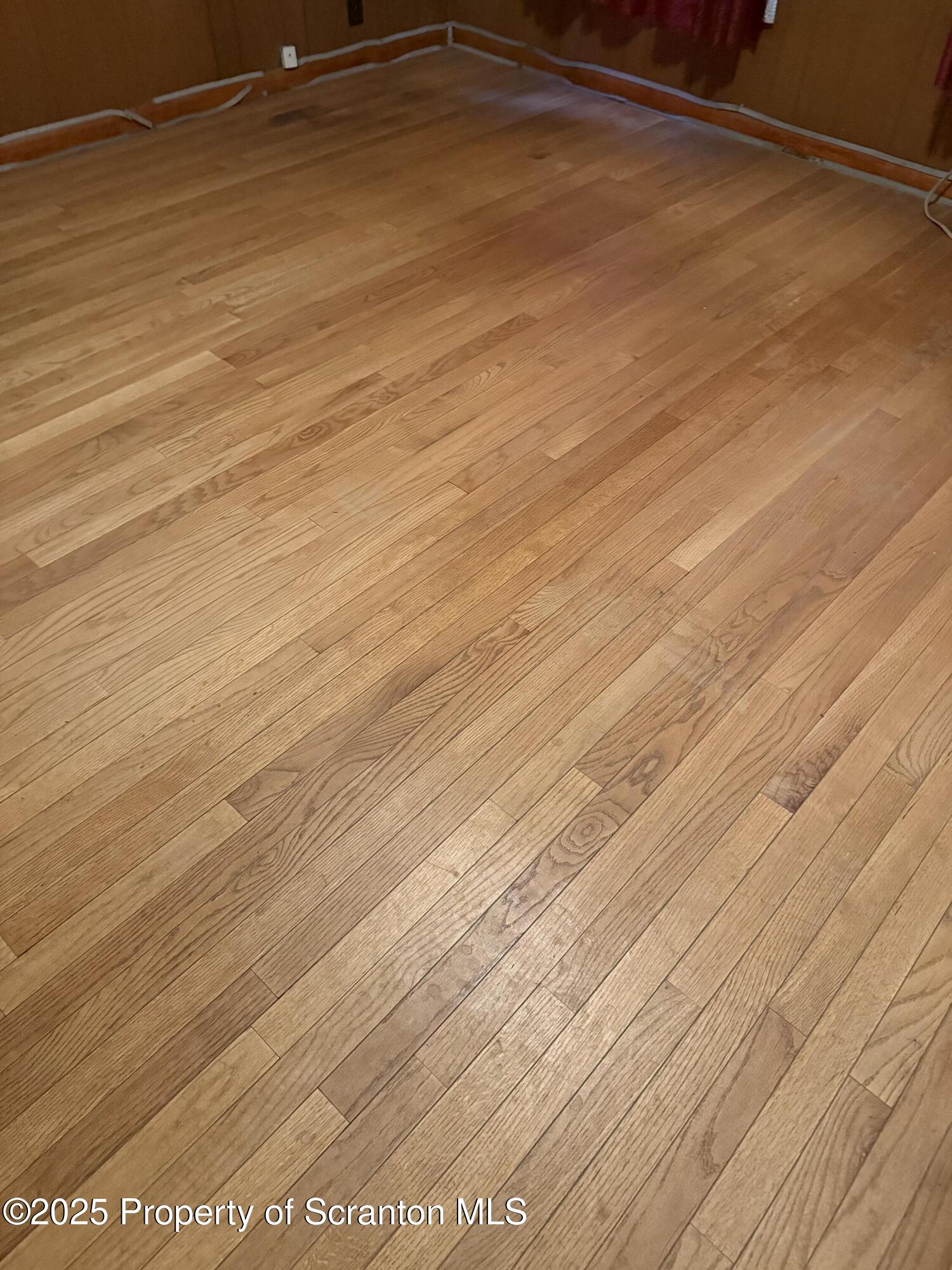 209 South Main Avenue Scranton, PA 18504 - Photo 17 of 21 a view of a room with wooden floor