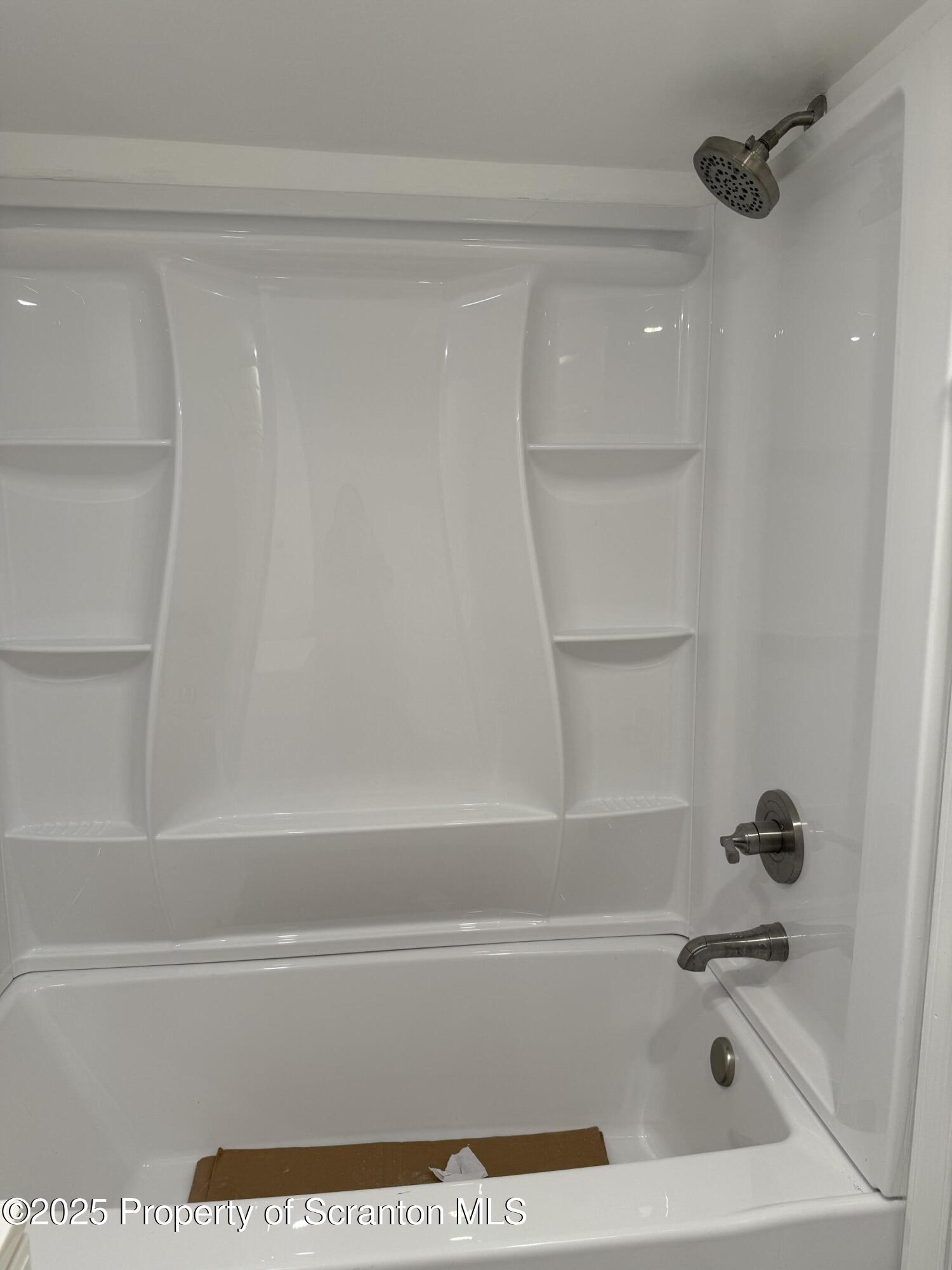 209 South Main Avenue Scranton, PA 18504 - Photo 19 of 21 a bathroom with a bathtub and a shower