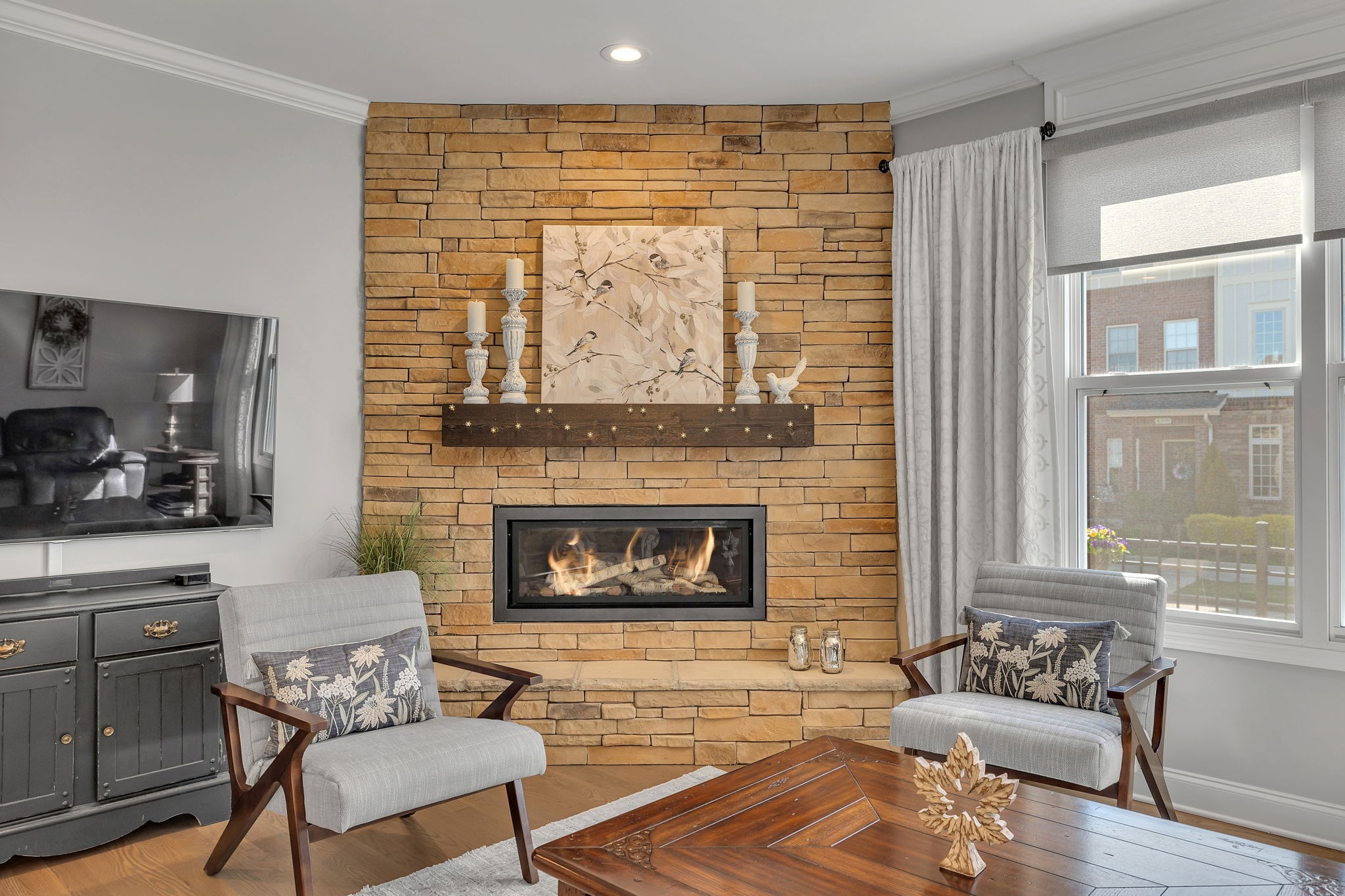 4132 Turnberry Road Spring Hill, TN 37174 - Photo 8 of 47 a living room with furniture and a fireplace