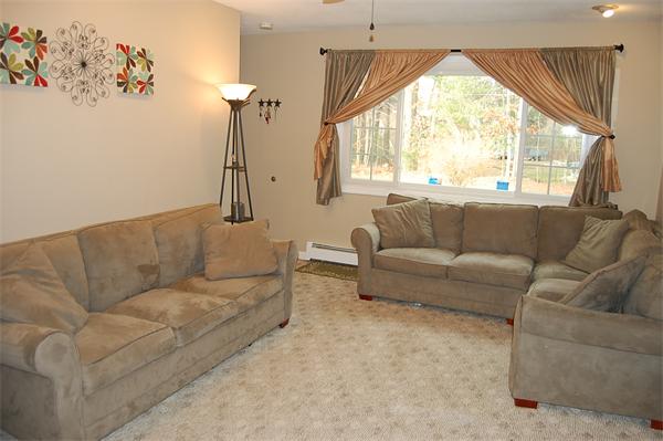 7 Old County Road Ware, MA 01082 - Photo 4 of 16 a living room with furniture and a large window