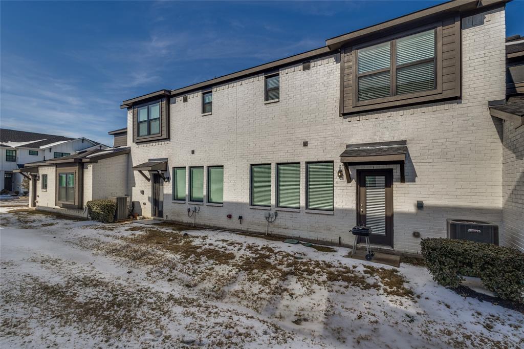 1118 Houston Way Lewisville, TX 75077 - Photo 12 of 12 a front view of a house with garden