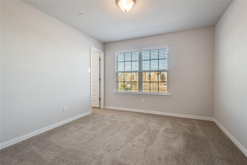 1118 Houston Way Lewisville, TX 75077 - Photo 6 of 12 an empty room with a window