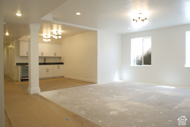 3504 North Sun Dancer Loop Logan, UT 84341 - Photo 39 of 59 Recessed lighting, wood-finish flooring, built-in cabinetry, dual windows, and a beverage refrigerator