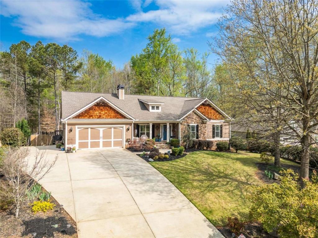 1948 Hearthstone Court Winder, GA 30680 - Photo 4 of 87 a front view of a house with a yard