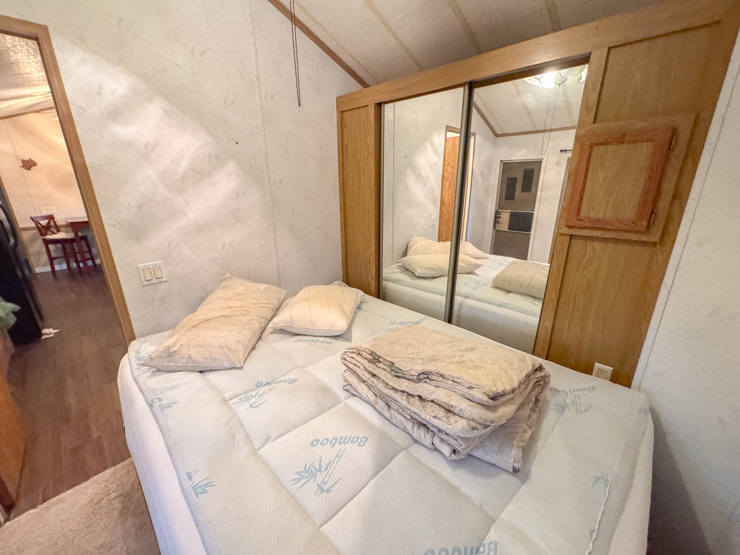 29-140 Woodhaven Sublette, IL 61367 - Photo 17 of 20 a bedroom with a bed and a mirror