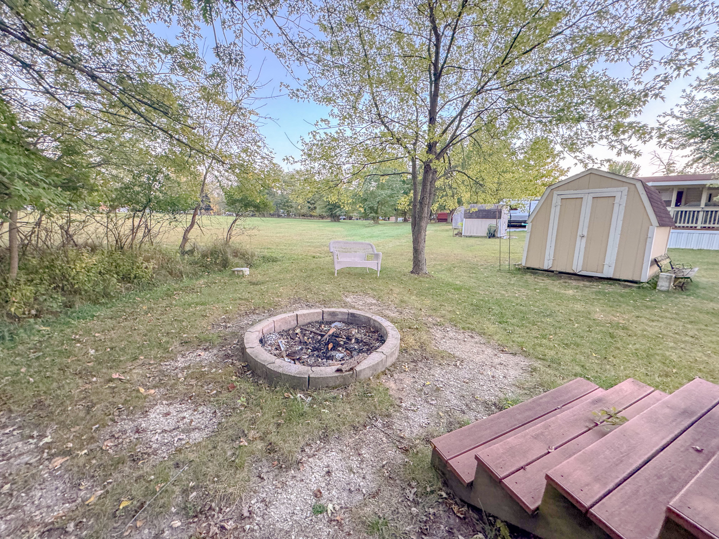 29-140 Woodhaven Sublette, IL 61367 - Photo 3 of 20 a view of a yard with a house and a tree