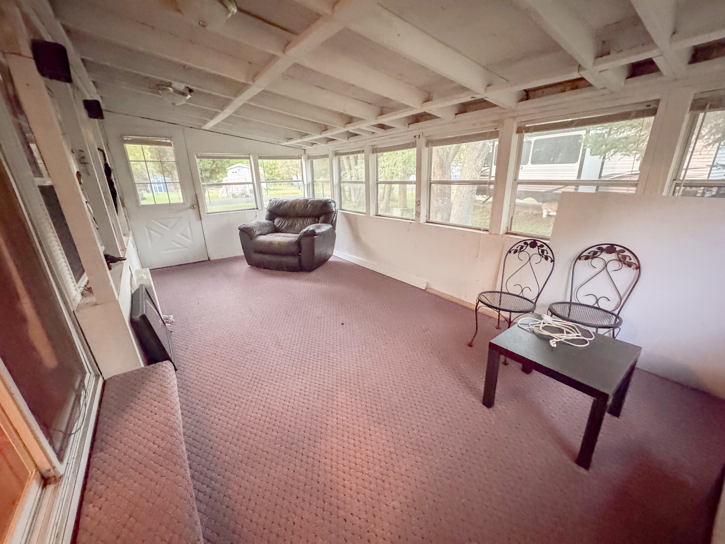 29-140 Woodhaven Sublette, IL 61367 - Photo 8 of 20 a living room with furniture and a window