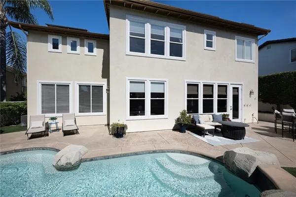 a view of a lounge chair in front of house