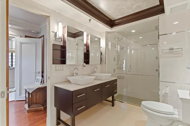 a bathroom with a bathtub and a shower