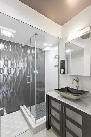 a white toilet sitting next to a shower curtain