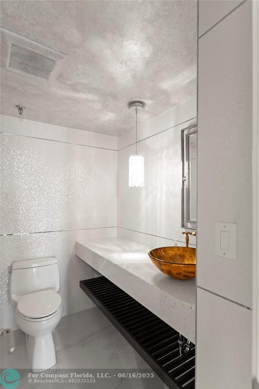 2917 South Ocean Boulevard, Unit 501 Highland Beach, FL 33487 - Photo 30 of 53 Half Guest Bathroom