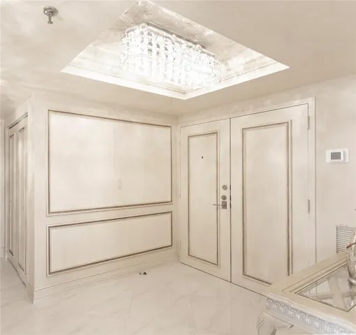 an empty room with wooden floor