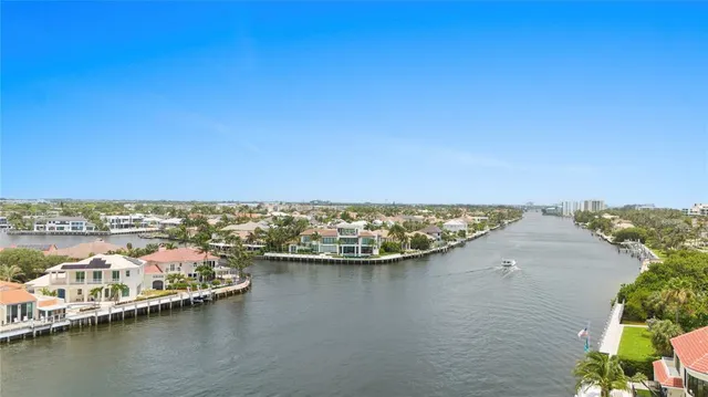 a view of a swimming pool with a lounge chair