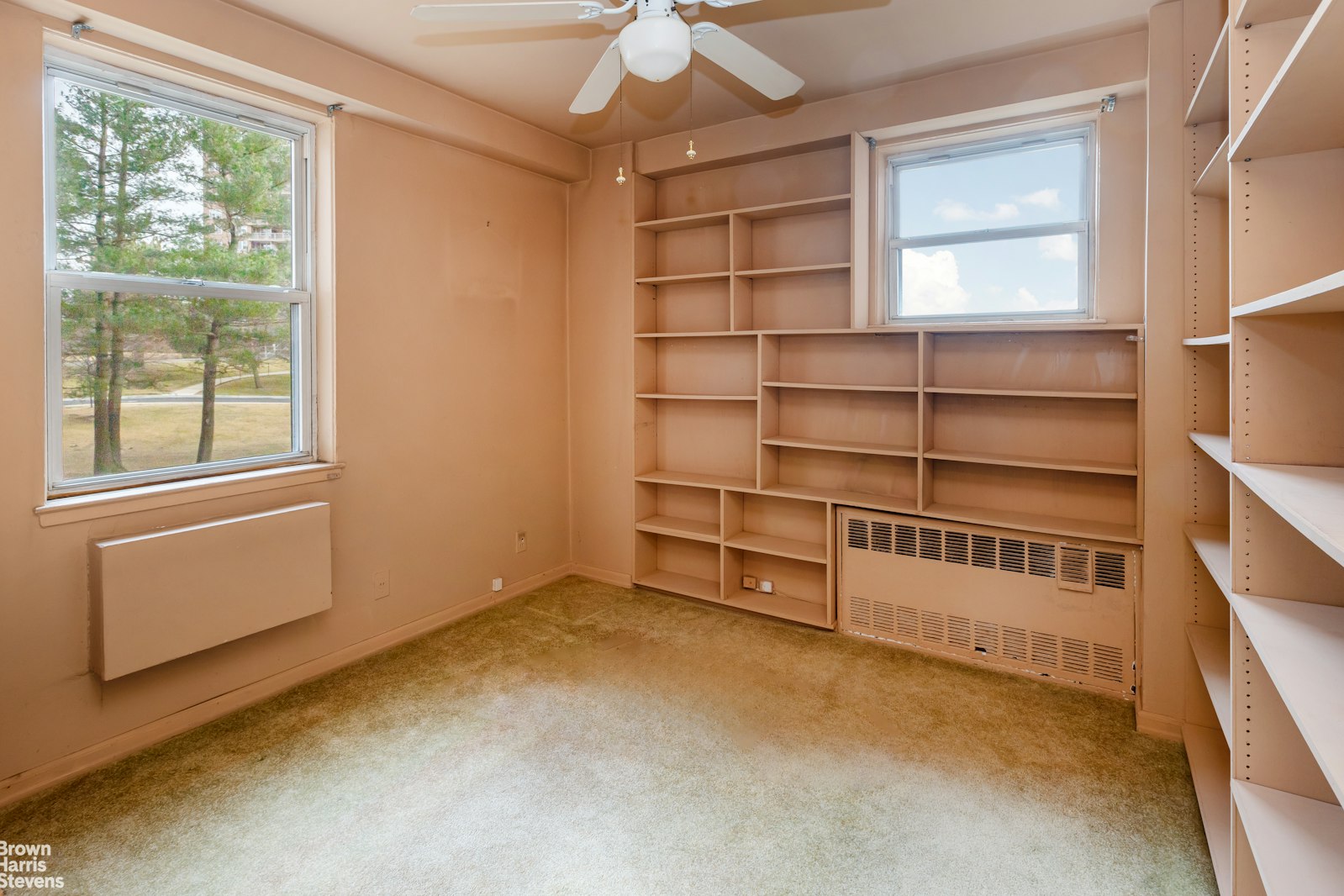 5700 Arlington Avenue, Unit 2X Bronx, NY 10471 - Photo 5 of 23 an empty room with a furniture and window
