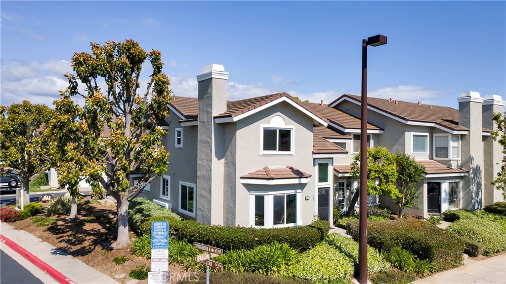 336 Fallingstar Irvine, CA 92614 - Photo 11 of 73 a front view of a house with a garden