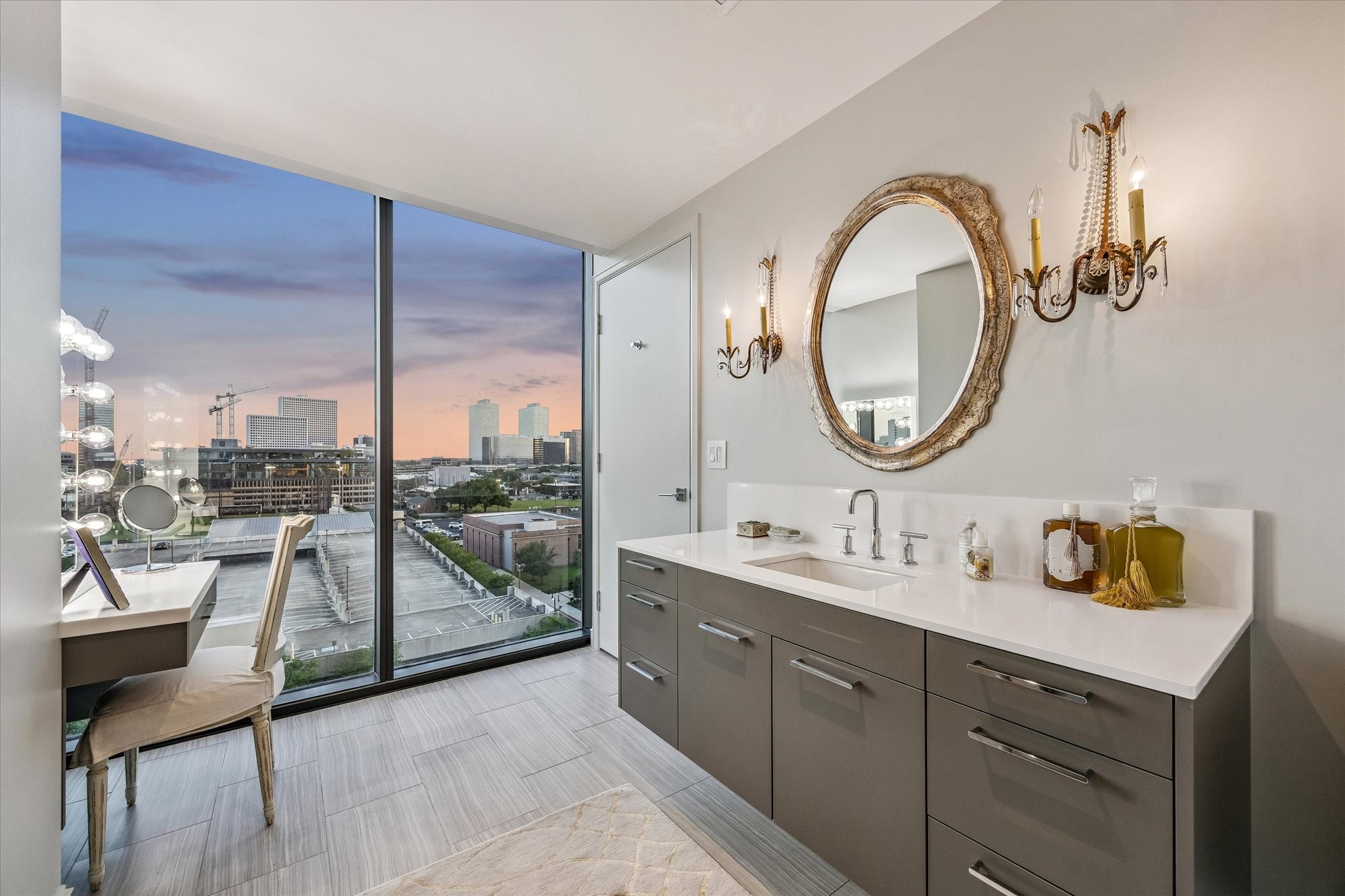 3433 Westheimer Road, Unit 706 Houston, TX 77027 - Photo 22 of 41 a en suite bathroom with a double vanity sink and a mirror