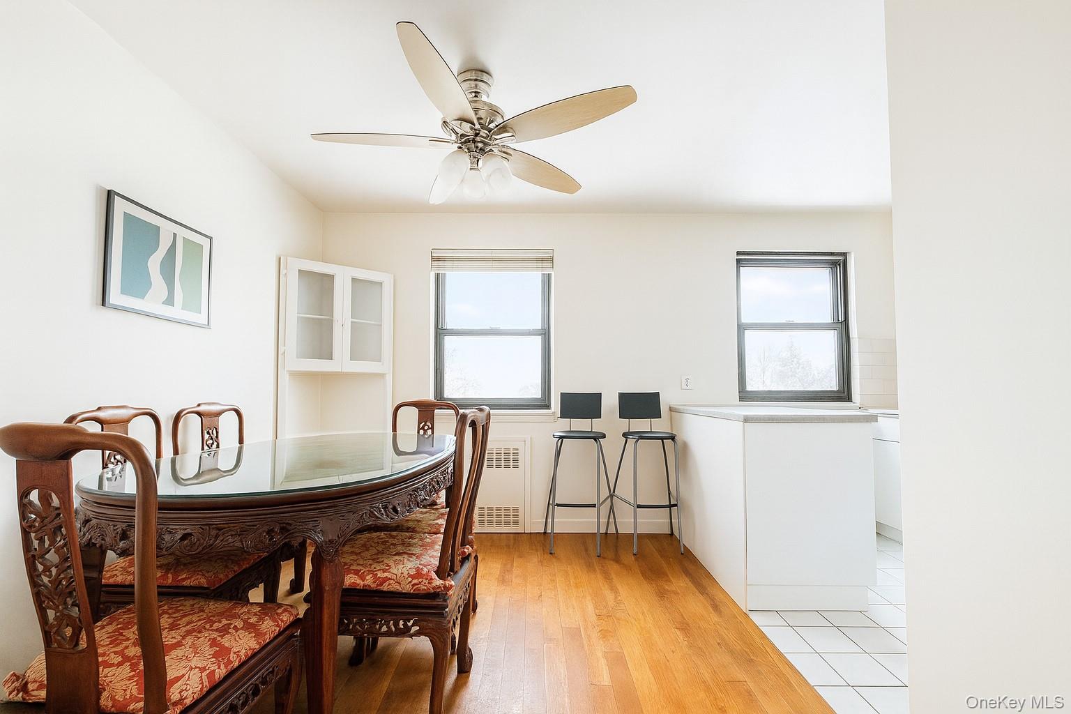 7 Terrace Circle, Unit 3D Great Neck, NY 11021 - Photo 11 of 31 a view of a dining room with furniture and window