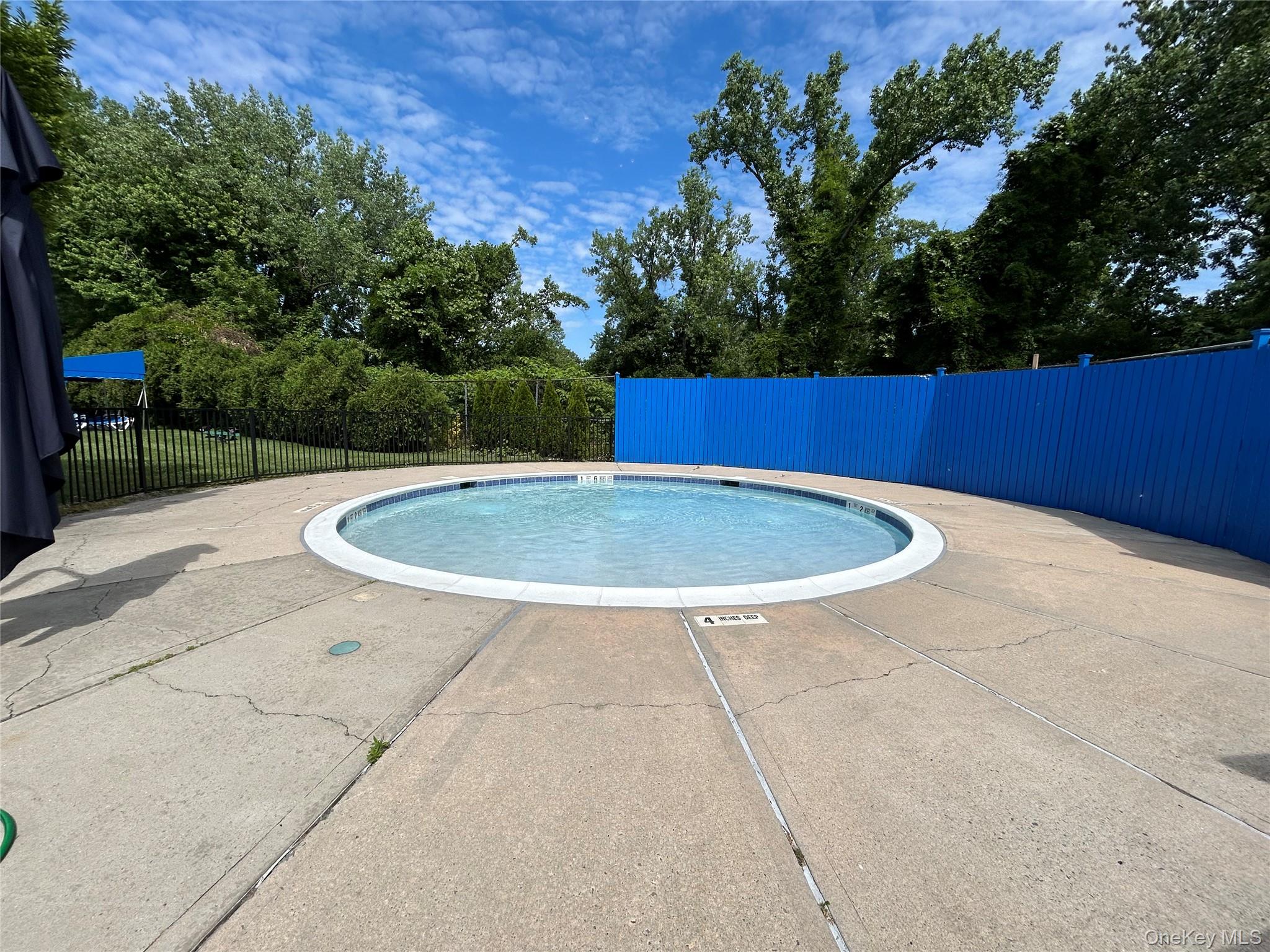 7 Terrace Circle, Unit 3D Great Neck, NY 11021 - Photo 23 of 31 a view of swimming pool