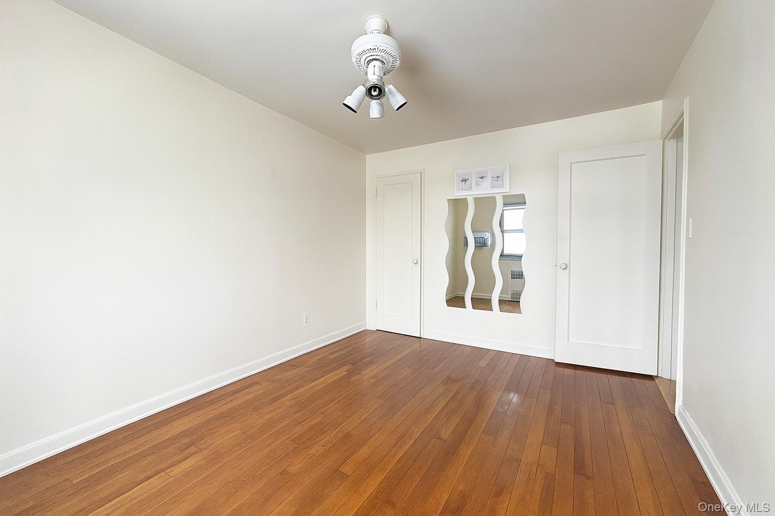 7 Terrace Circle, Unit 3D Great Neck, NY 11021 - Photo 7 of 31 a view of livingroom with hardwood