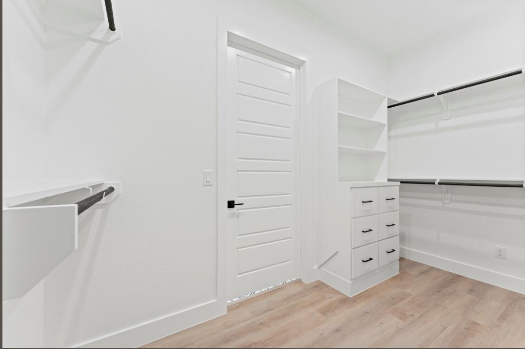 15045 Tybee Lane Conroe, TX 77306 - Photo 31 of 41 a view of walk in closet