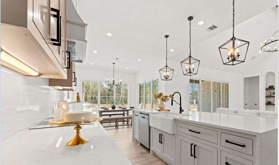 15045 Tybee Lane Conroe, TX 77306 - Photo 38 of 41 a very nice looking room with kitchen area and furniture