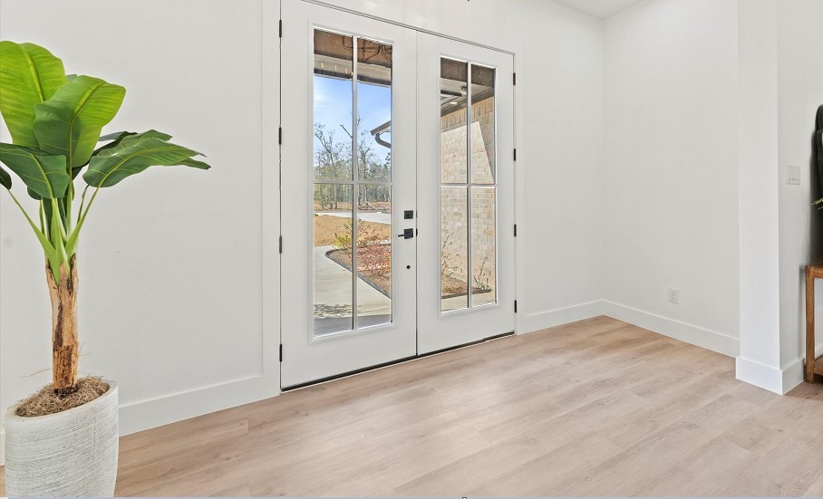 15045 Tybee Lane Conroe, TX 77306 - Photo 39 of 41 an empty room with windows