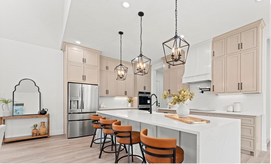 15045 Tybee Lane Conroe, TX 77306 - Photo 40 of 41 a kitchen with stainless steel appliances granite countertop a stove a sink dishwasher a refrigerator with white cabinets and wooden floor