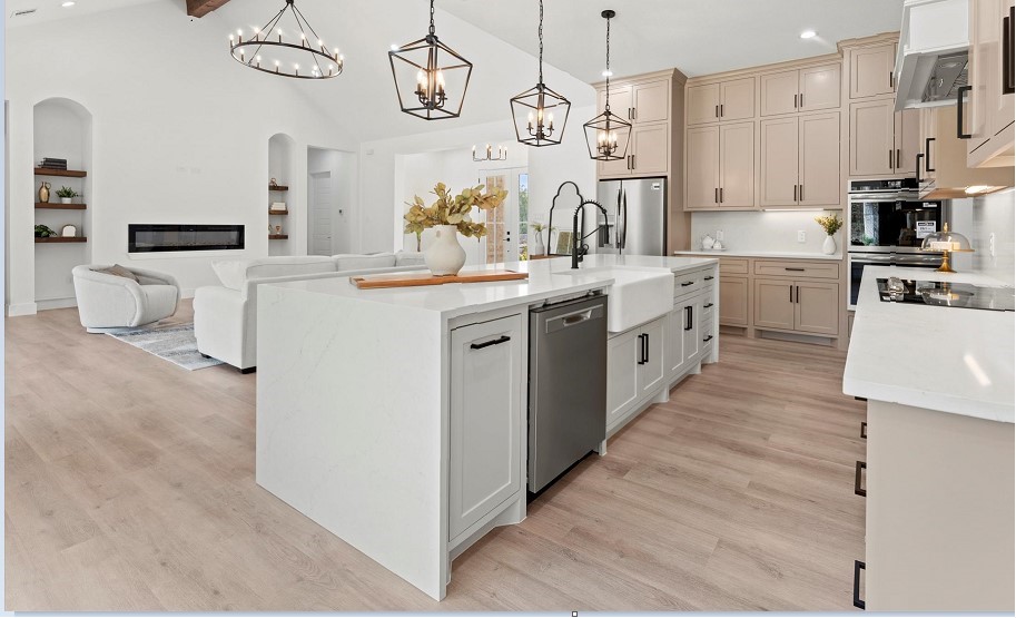 15045 Tybee Lane Conroe, TX 77306 - Photo 41 of 41 a kitchen with cabinets a sink and stainless steel appliances