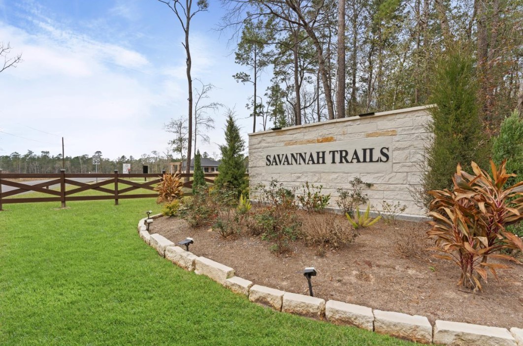 15045 Tybee Lane Conroe, TX 77306 - Photo 5 of 41 a sign that is on the side of a road