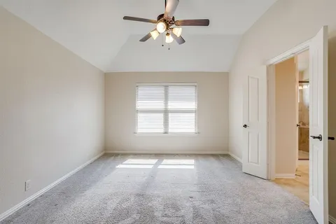 a view of empty room with a window