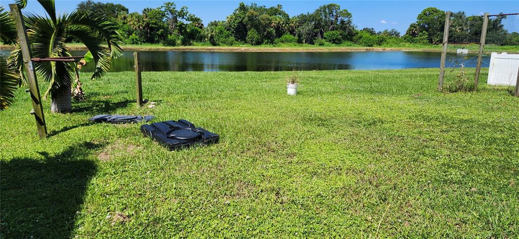 7524 Dragon Fly Loop Gibsonton, FL 33534 - Photo 14 of 55 a lake view with a big yard