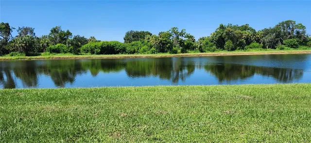 a house that has a garden in front of it