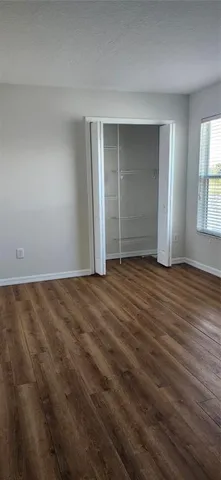 a view of a room that has a window in it