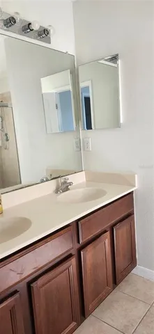 a stove top oven sitting inside of a kitchen