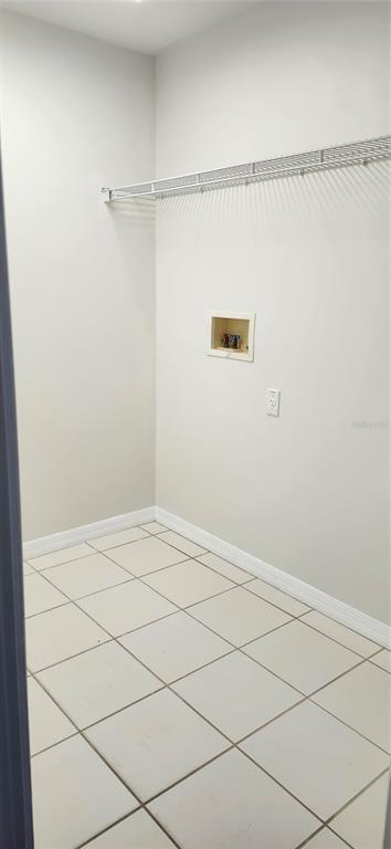 7524 Dragon Fly Loop Gibsonton, FL 33534 - Photo 32 of 55 a view of a room with racks on the wall