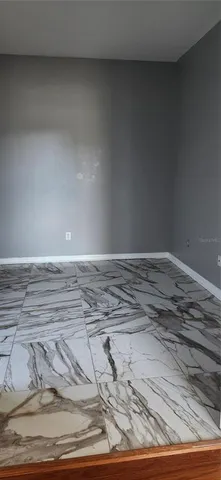 a stove top oven sitting inside of a kitchen
