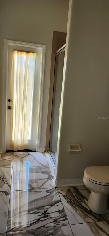 7524 Dragon Fly Loop Gibsonton, FL 33534 - Photo 46 of 55 a bathroom with a toilet