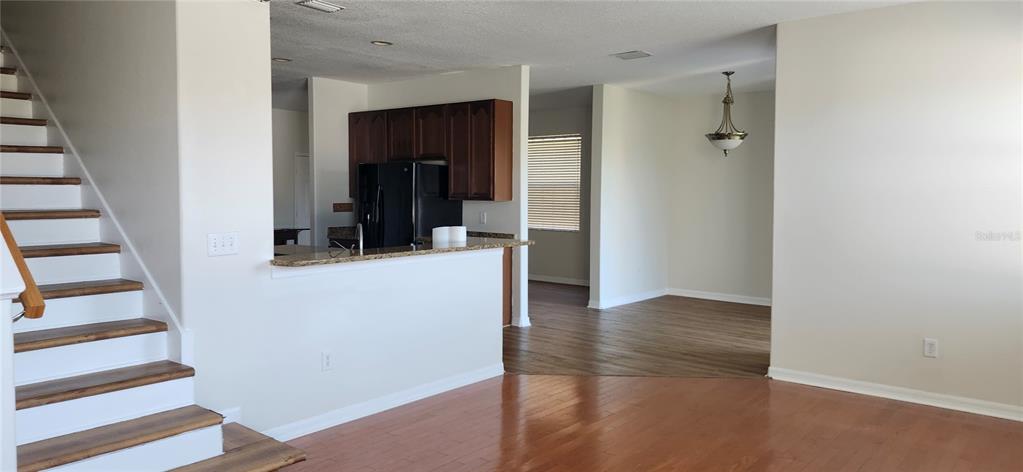 7524 Dragon Fly Loop Gibsonton, FL 33534 - Photo 47 of 55 wooden floor in a hall with an entryway