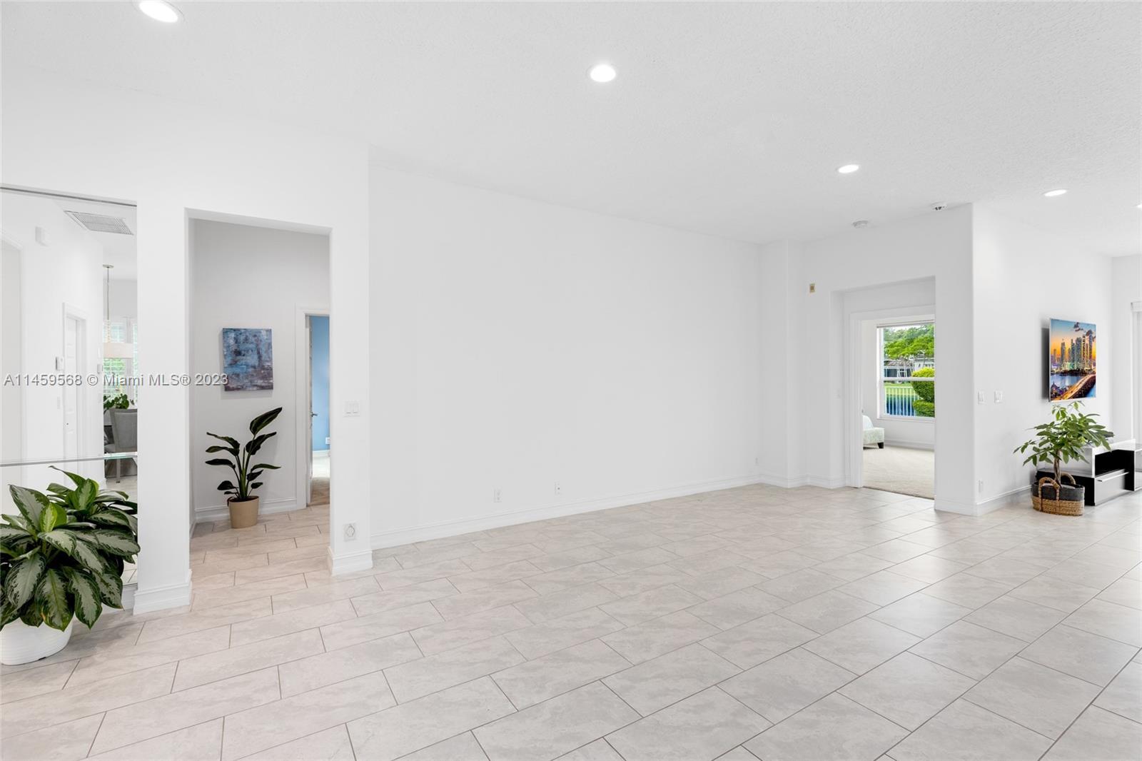 5675 Regency Circle West Boca Raton, FL 33496 - Photo 16 of 74 a view of an empty room and a dining room