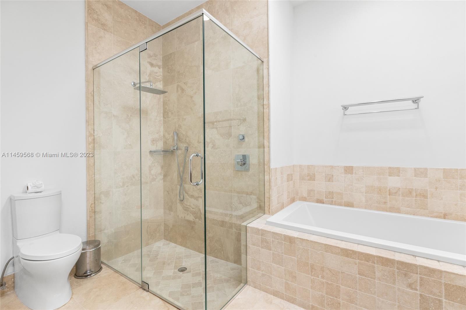 5675 Regency Circle West Boca Raton, FL 33496 - Photo 19 of 74 a bathroom with a shower and a toilet