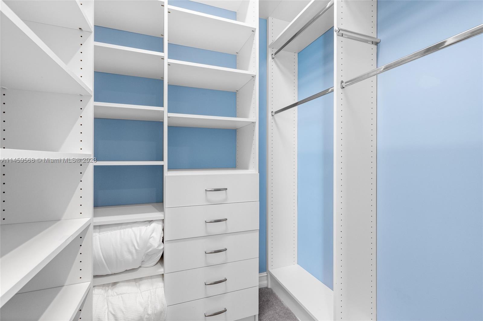 5675 Regency Circle West Boca Raton, FL 33496 - Photo 24 of 74 a view of walk in closet