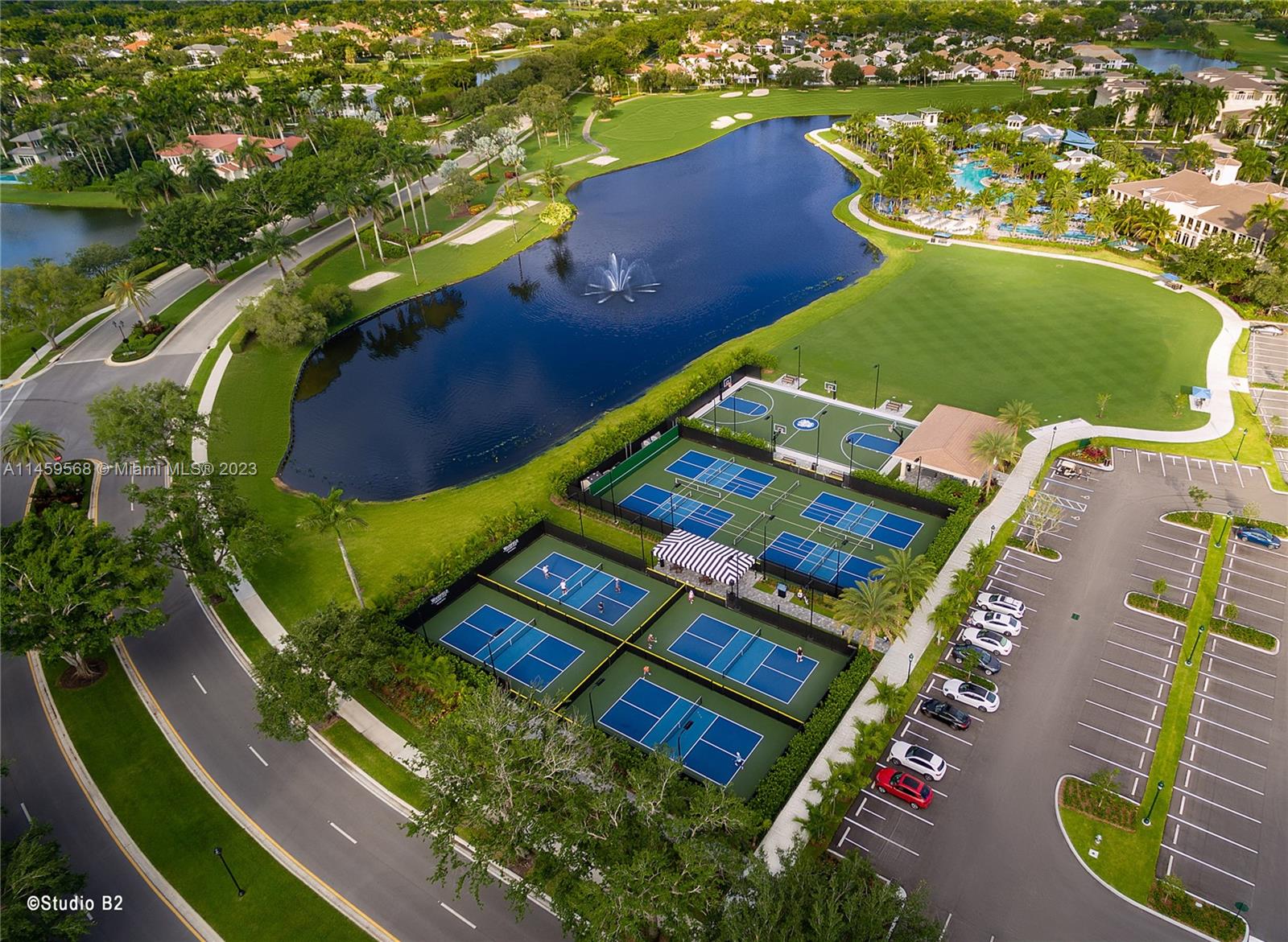 5675 Regency Circle West Boca Raton, FL 33496 - Photo 49 of 74 an aerial view of a pool patio yard and outdoor seating